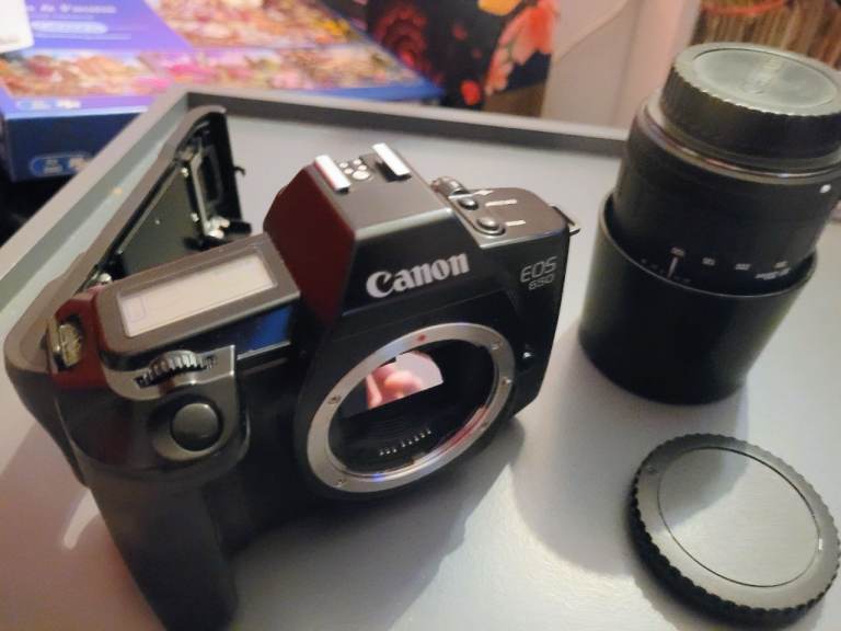 Canon EOS 650 film camera with Sigma zoom 100-300mm lens