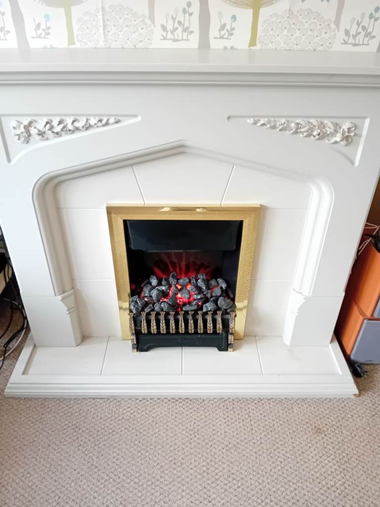 Fireplace including fan heater