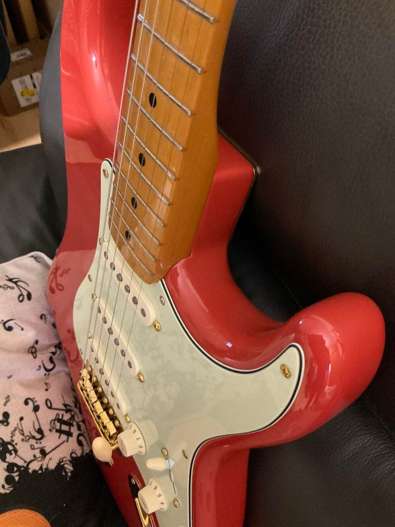 Fender Stratocaster with upgraded Fender gold hardware   