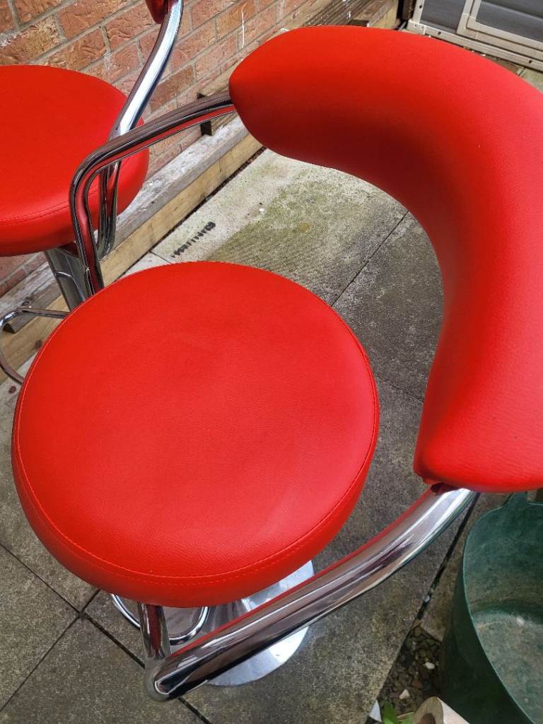 Red bar stools.