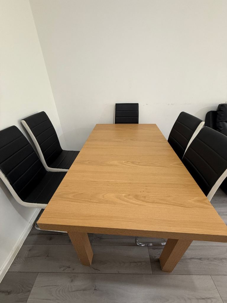 Extendable Brown Wooden Dining Table with 5 Black Chairs