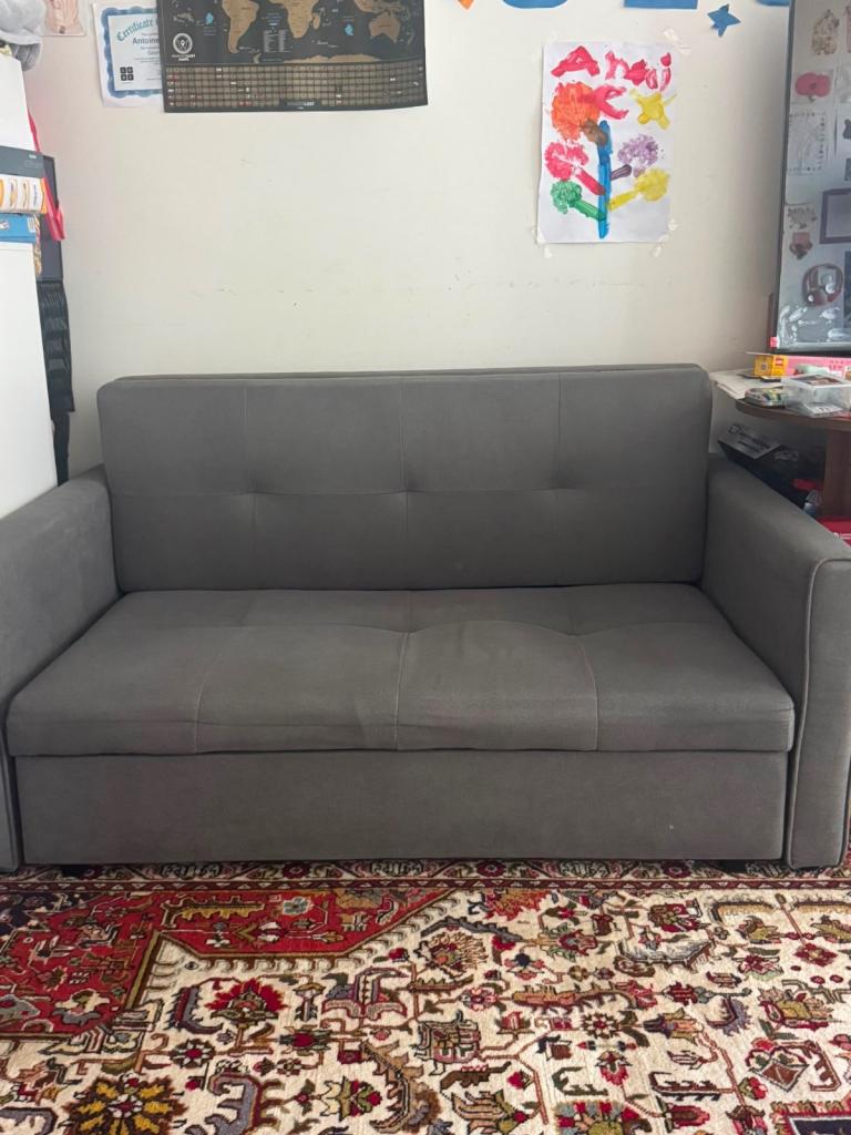 Grey Sofa Bed, Good Condition – Ready for a New Home
