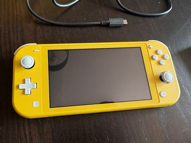 Nintendo Switch Lite (Yellow) with Official Carry Case and Charger