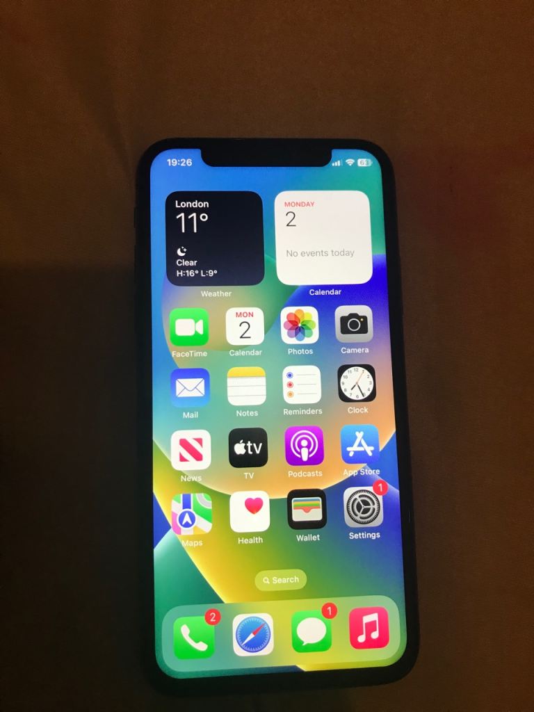 Apple iPhone X fitted a new camera lense unlocked tiny crack at back screen looks new 