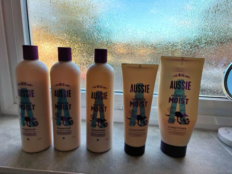 2 1/2 bottles of  aussie hair shampoo + 2 part  bottles of  conditioner  ( southampton  