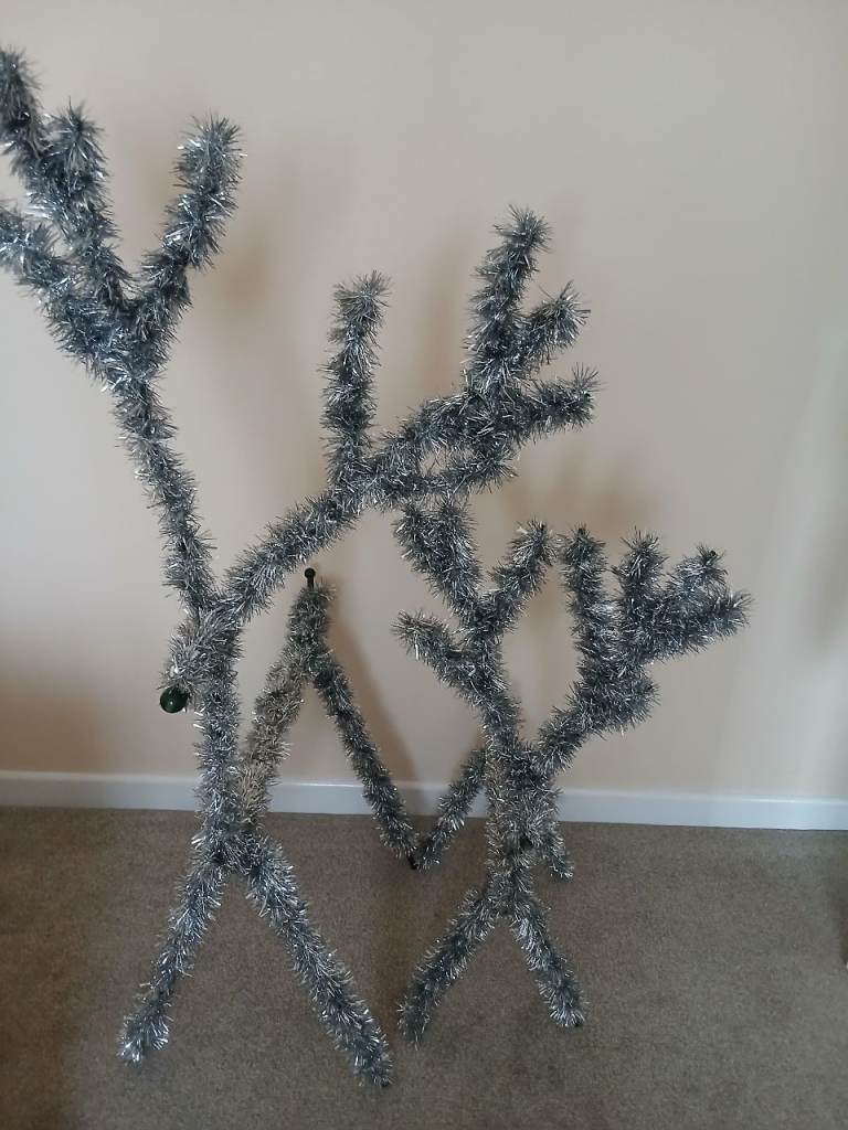 Unusual Metal Reindeers Decorated With Tinsel 