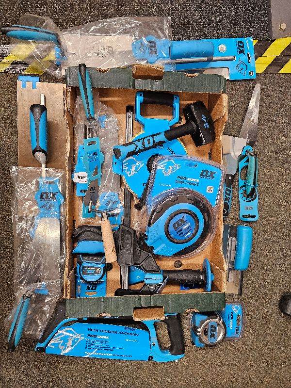 Selection of OX tools Tape measures, trowels, chisels etc