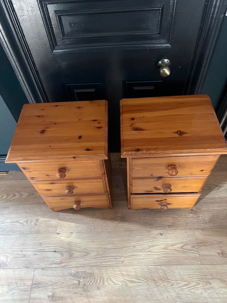 Two solid pine 3 drawer bedside cabinets