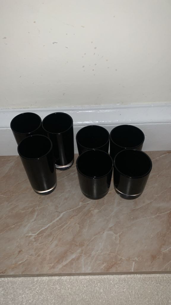Black tumbler glasses