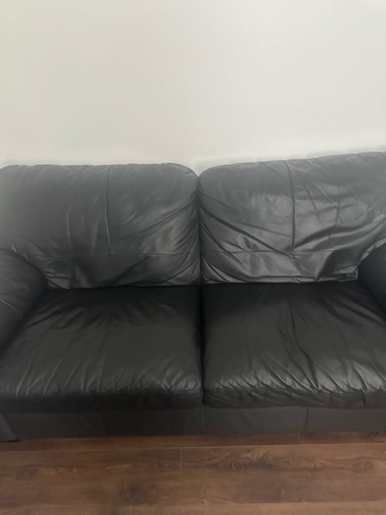 Black Leather Two-Seater Sofa – good Condition