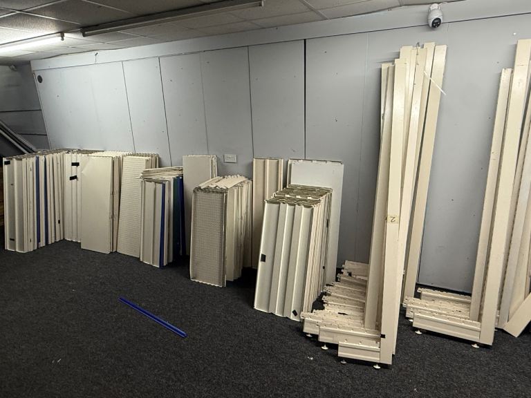 Over 25 units of shop shelving
