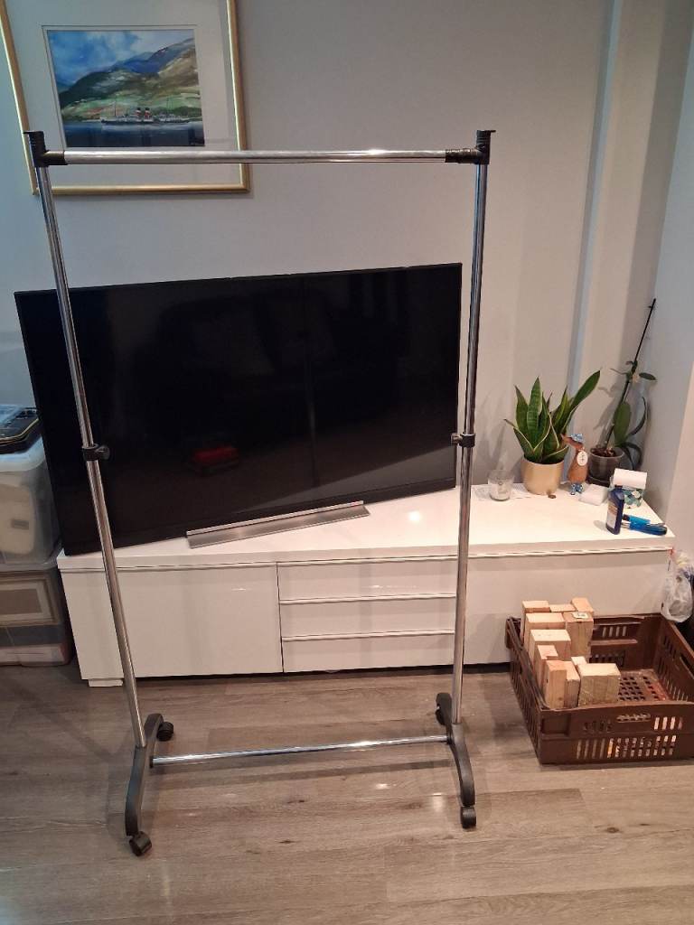 Metal Clothes Rail with Wheels – Good Condition