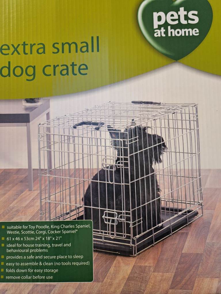 Small pet crate, cocker spaniel suitable.