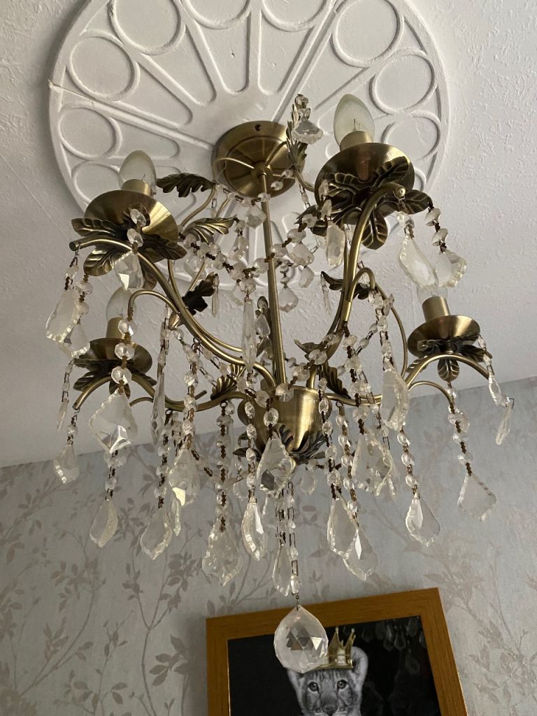 5 Arm Chandalier ceiling light Antic brass colour bulbs included.