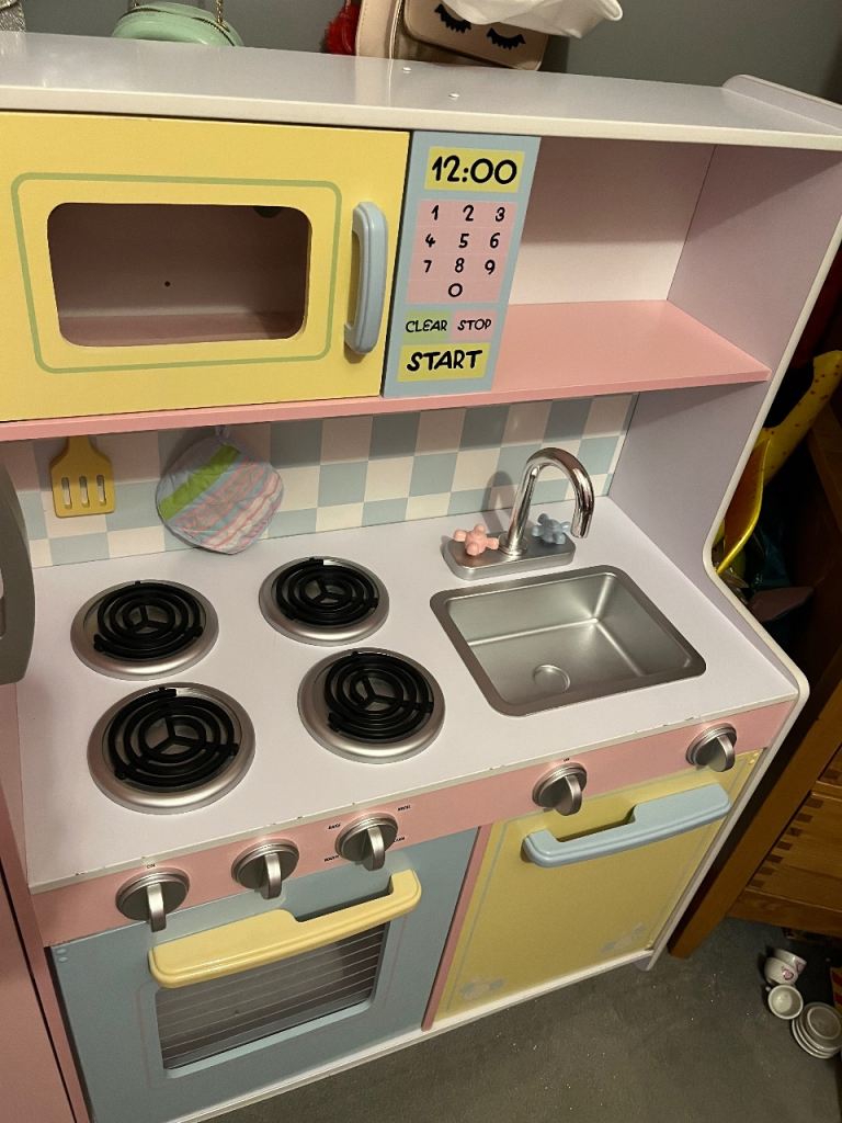 Large wooden toy kitchen