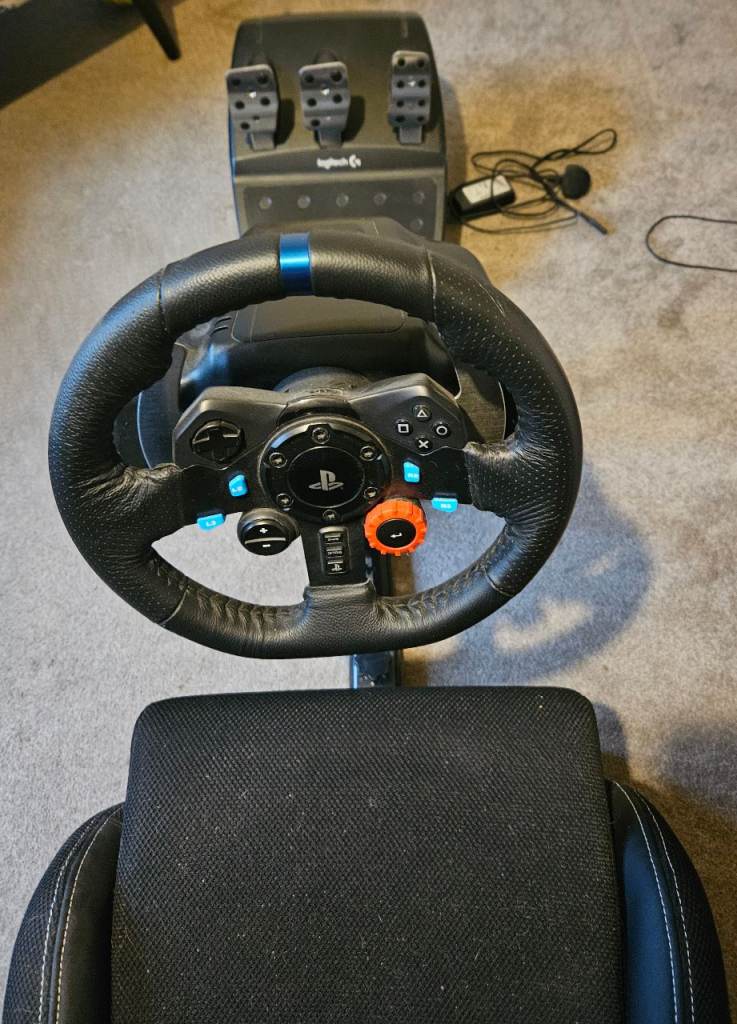 Logitech G29 Driving Force Racing Wheel, and playseat.