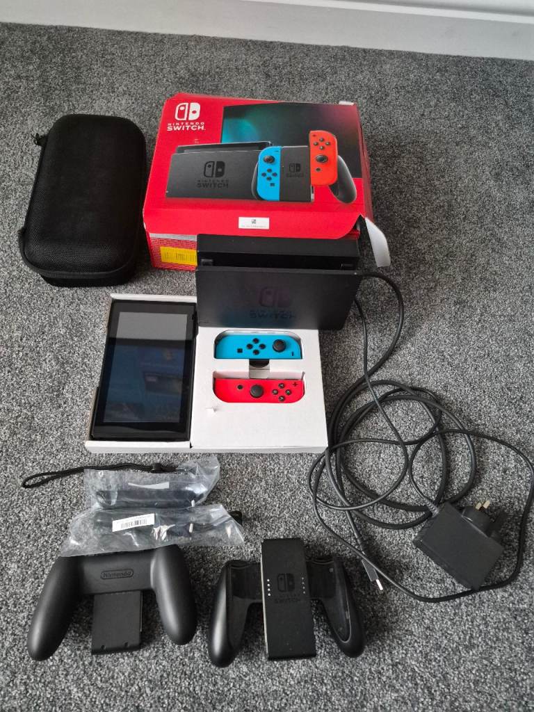 Nintendo Switch Console with Games and Accessories – Good Condition