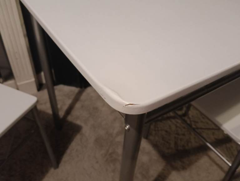 White dining table and four chairs feel free to contact me 