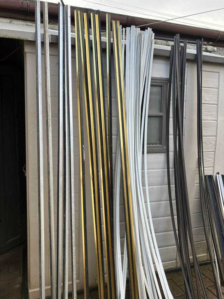Draught Excluders for Doors. Brass £2 EACH Plastic £1 EACH (Feel Free to View)