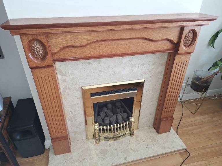 Wooden Fire Surround and Electric Fireplace – Good Condition