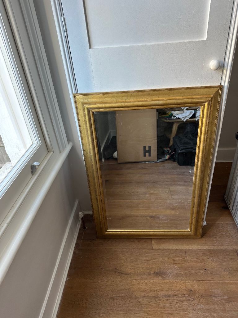 Gold framed mirror