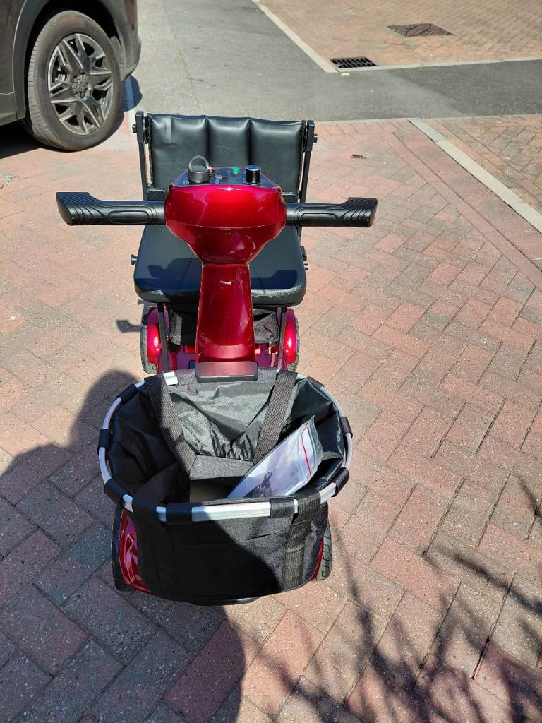 Red Mobility Scooter with Front Basket – Good Condition