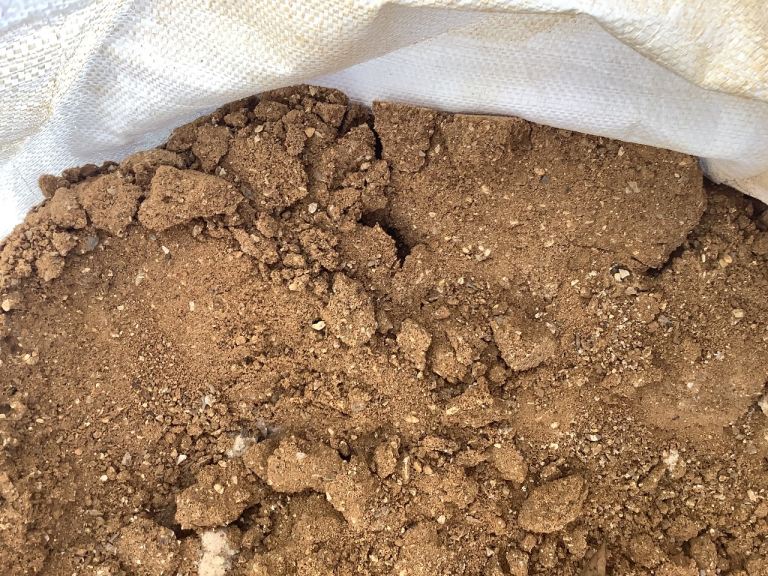 Half bag of sharp sand 