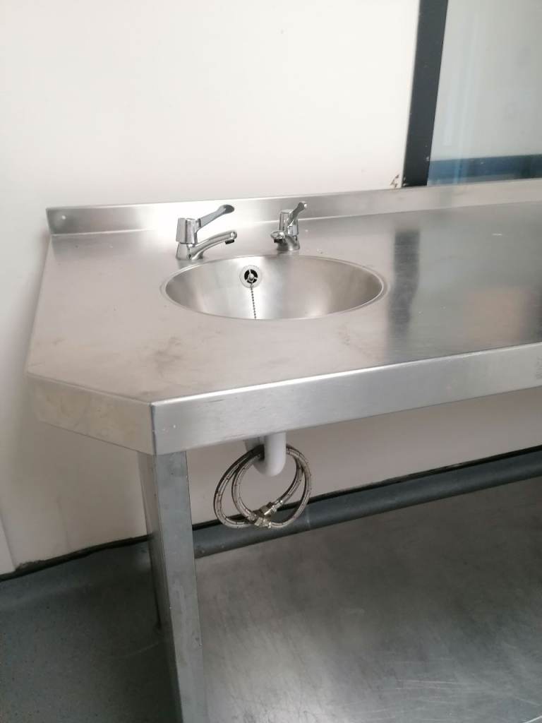 Stainless steel table with sink 