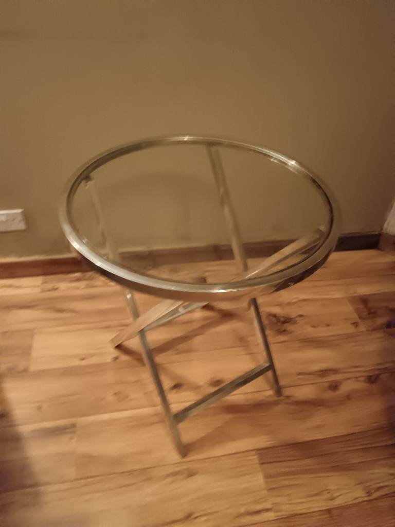 Small glass round table. 