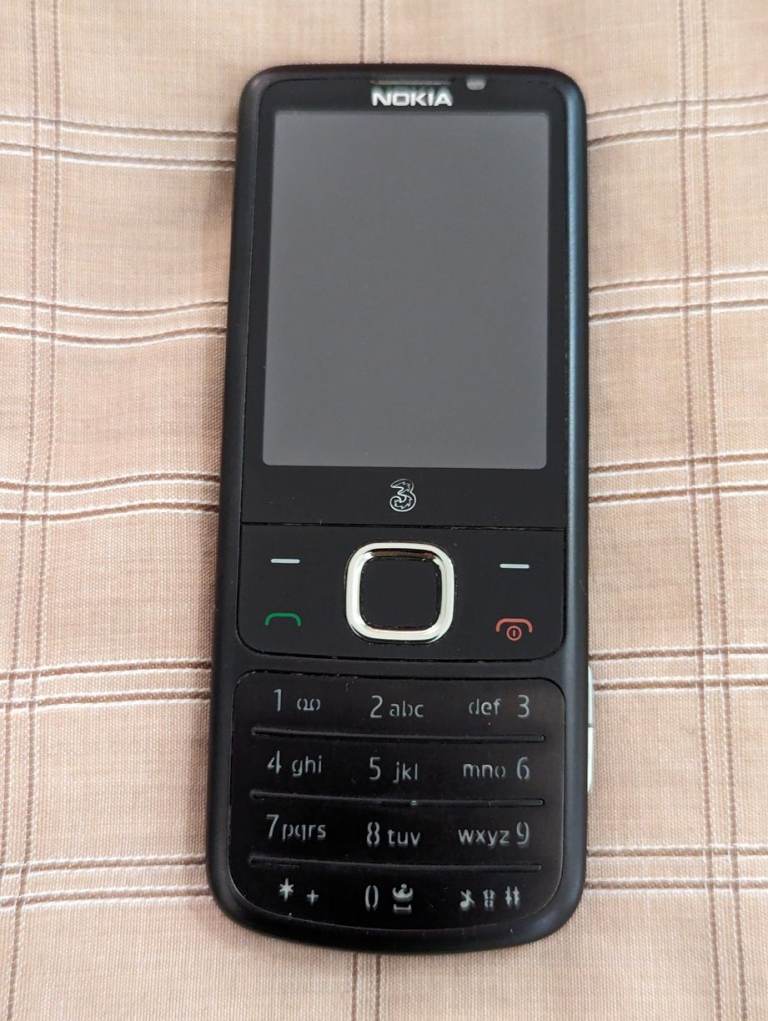 Nokia 6700 Classic with box, charger manual and accessories shown - retro vintage