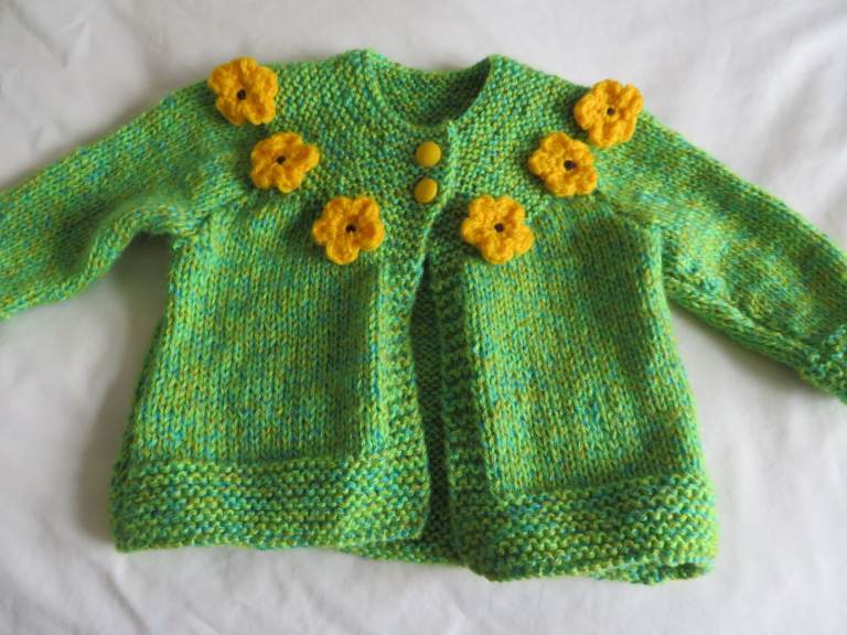 Lovely New hand knitted cardigan for a baby or doll green/yellow