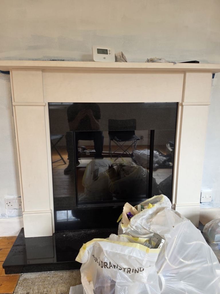 Cream Fireplace Surround with Black Granite Hearth