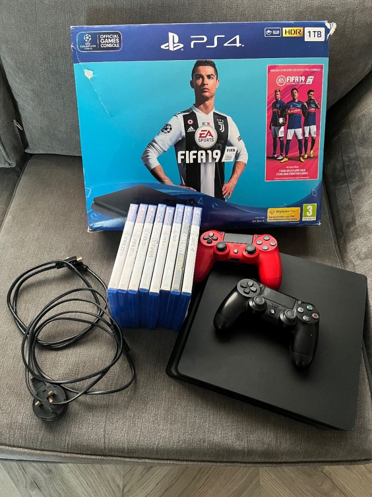 Sony PS4 Console 1TB with Two Controllers and Games