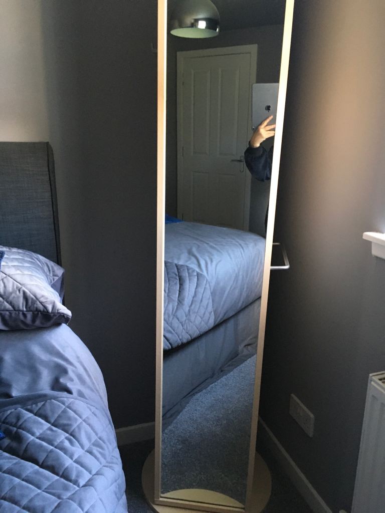 Rotating mirrored bedroom unit  with storage