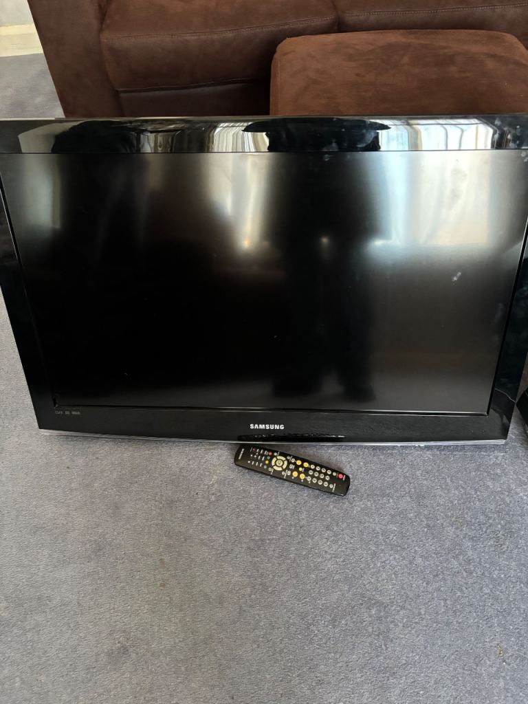 Samsung LE37A456C2D including Tv remote and pedestal tabletop stand base 