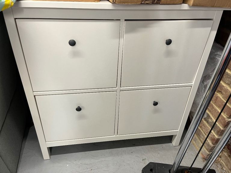 TWO White 4-door shoe cabinets