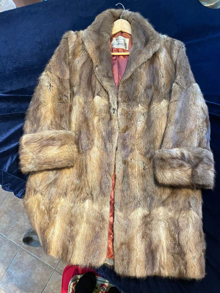 Vintage fur coat with attractive red lining