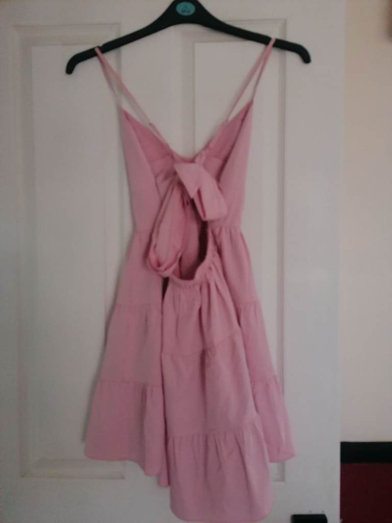 Lovely light pink summer dress with tiered skirt and spaghetti straps