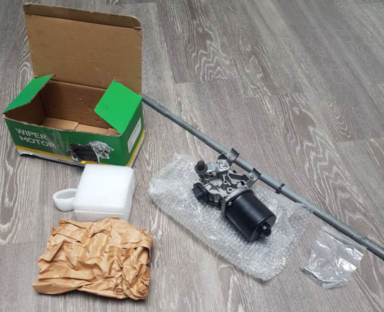 NEW WIPER MOTOR AND LINKAGE BAR AND FITTINGS