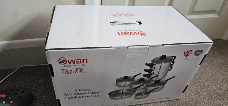 Brand new, unopened Swan 8 piece stainless steel cookware set 