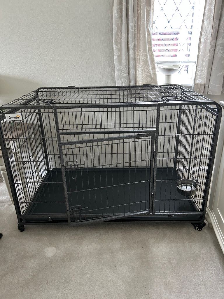 Very large top of the range PAWHUT dog crate with wheels. As new