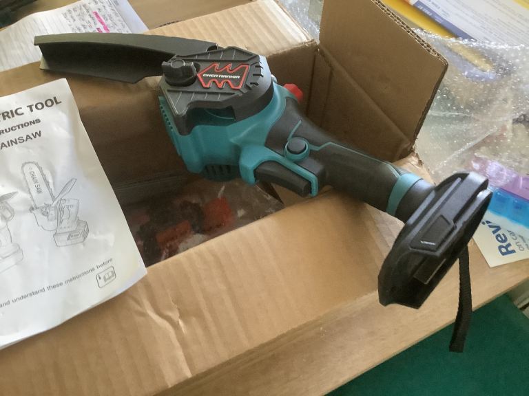 Battery operated chain saw 8”.