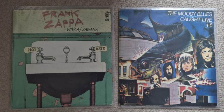 Two Vinyl LP Records  Frank Zappa Waka/Jawaka and Moody Blues Caught Live