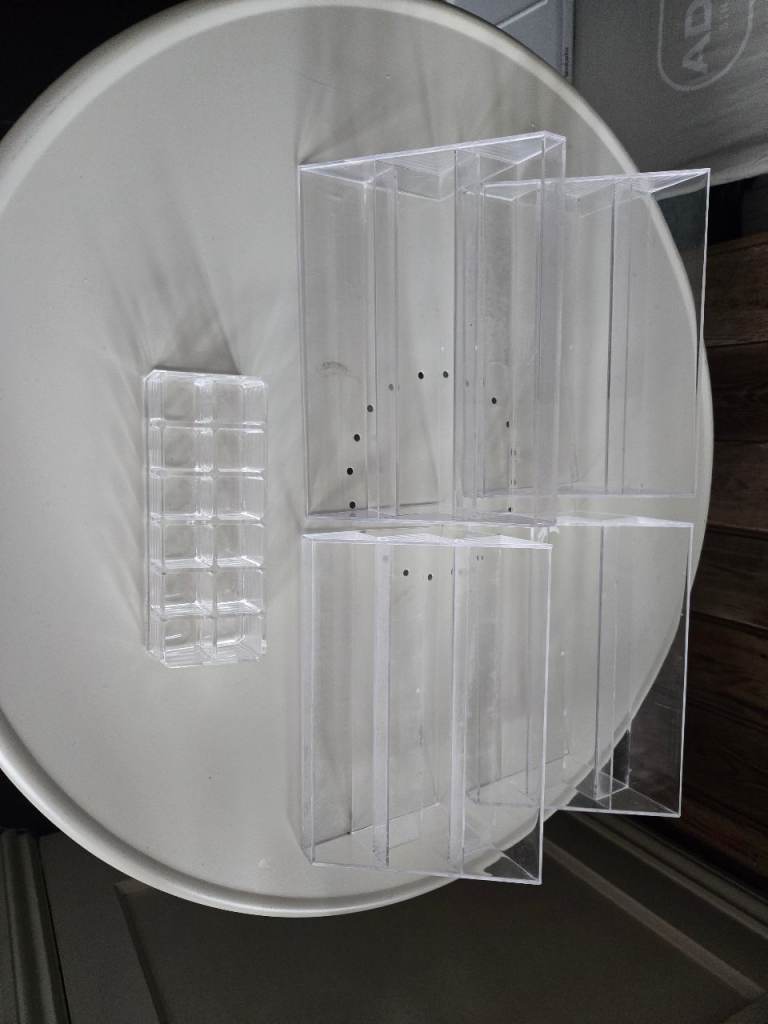 Set of tiered clear acrylic display stands