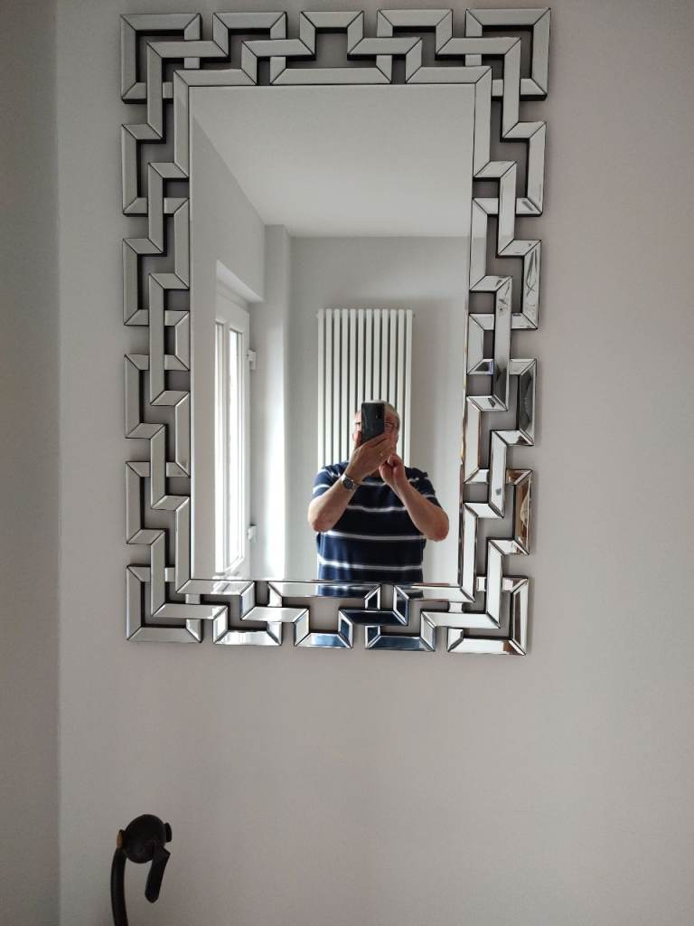 Mirror  size  High 100 cm  wide 66 cm.