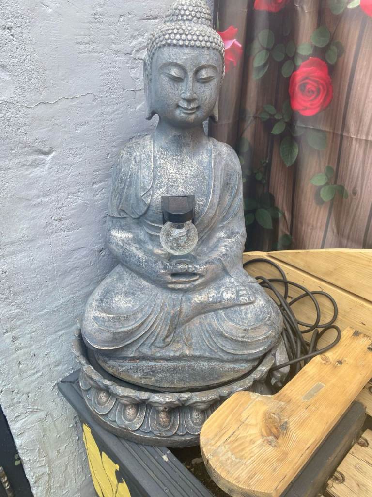 Buddha garden water feature in good condition 