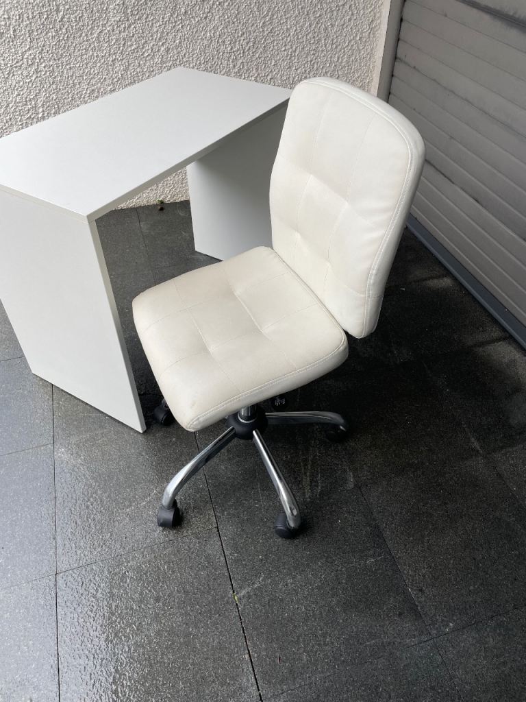 White desk and swivel chair 