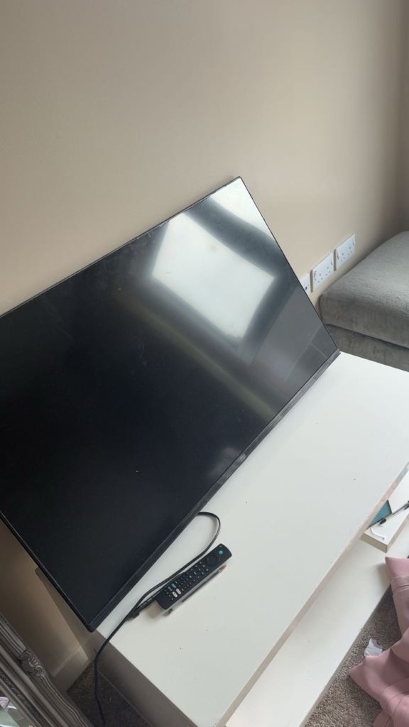 Large Black Flat Screen TV with Remote – Good Condition