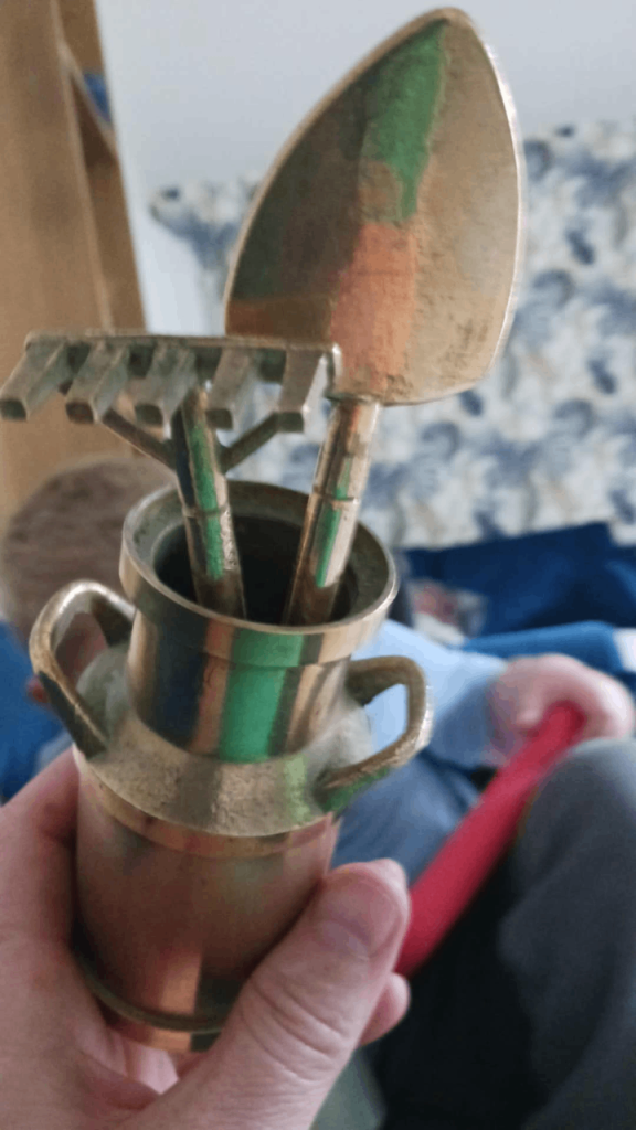 Little brass milk churn with tools 