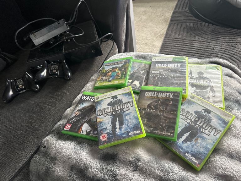 Xbox one console with 2 controllers and 8 games 